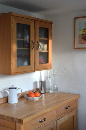 Image of Kitchen Cabinets Made from Teak Wood. But Can You Paint Teak Wood?