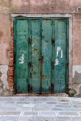 Image of a rusted door. So Can You Paint Over a Rusted Door?